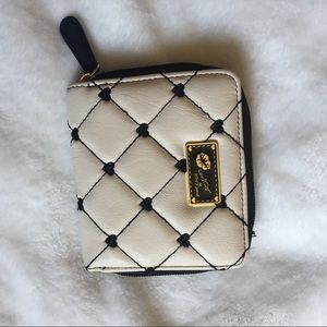Small odd-white Betsey Johnson wallet