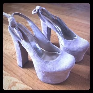 Wild pair suede pumps