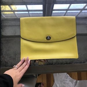 Yellow leather coach envelop clutch
