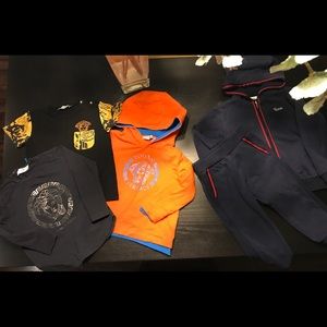 Toddler designer shirts an sweat suit.authentic