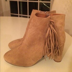 Fringed tan boots