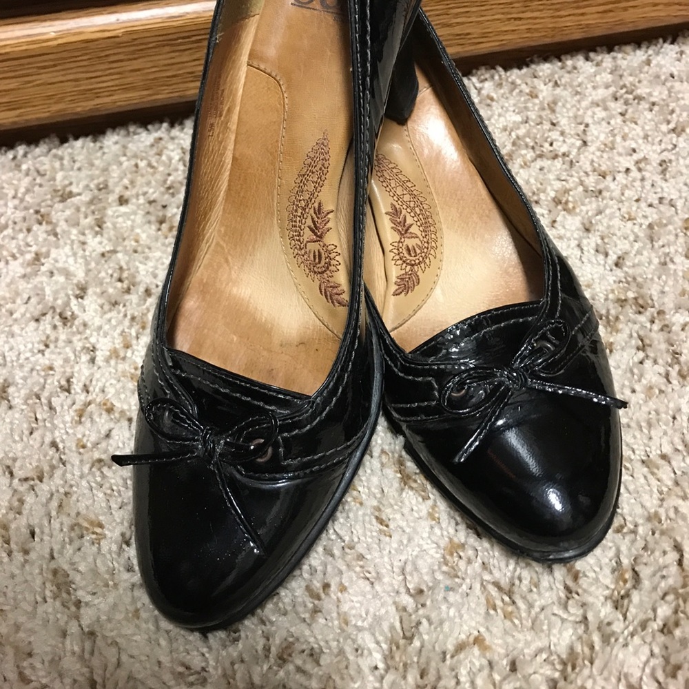Black patten leather pumps