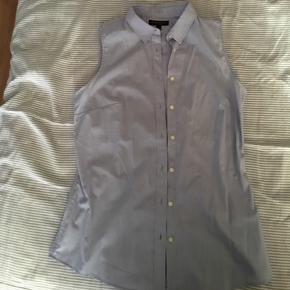 Light blue button up sleeveless shirt