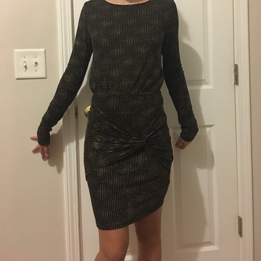 Black and gold dress .