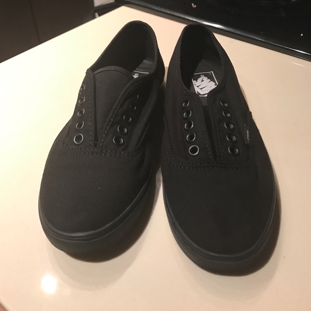 All black low profile Vans
