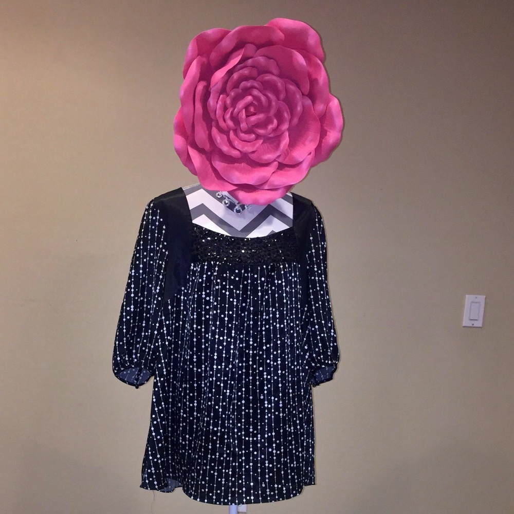 Black with with polka dot blouse! " Apostrophe"