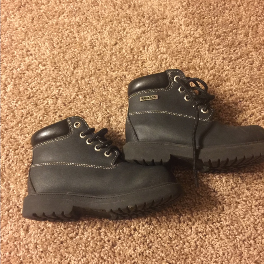 Steel toe waterproof kids boots.