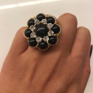 Gold and black floral ring