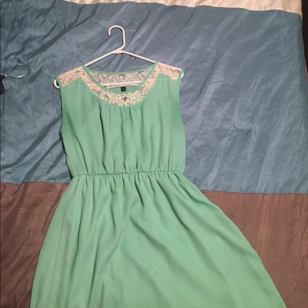 Teal and cream dress.