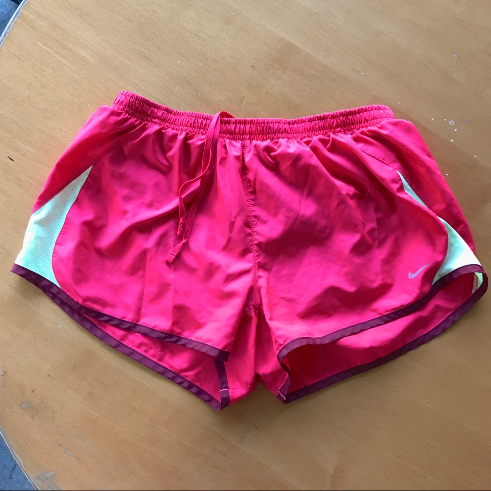 Nike red and yellow running shorts
