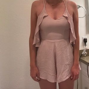 Ruffled cross-back light purple/pink romper
