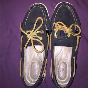 Black and gold Sperry's