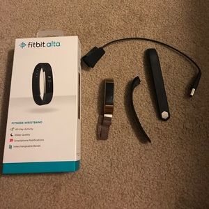 Large Fitbit Alta with two bands used