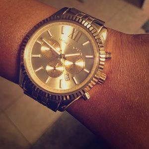 Unisex Gold Michael Kors watch.