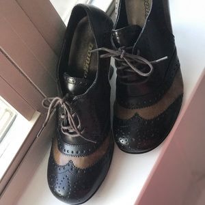 Bongo brown and caramel tan wing tip booties.