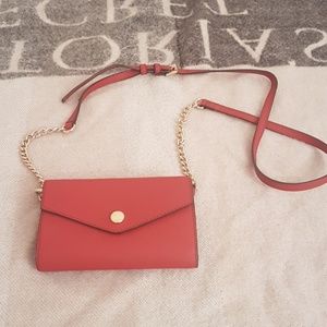 Red Michael Kors crossbody bag