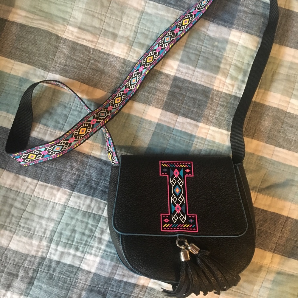 Justice initial I purse