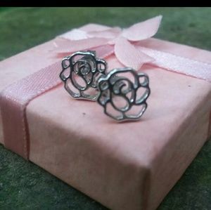 new silver rose studs