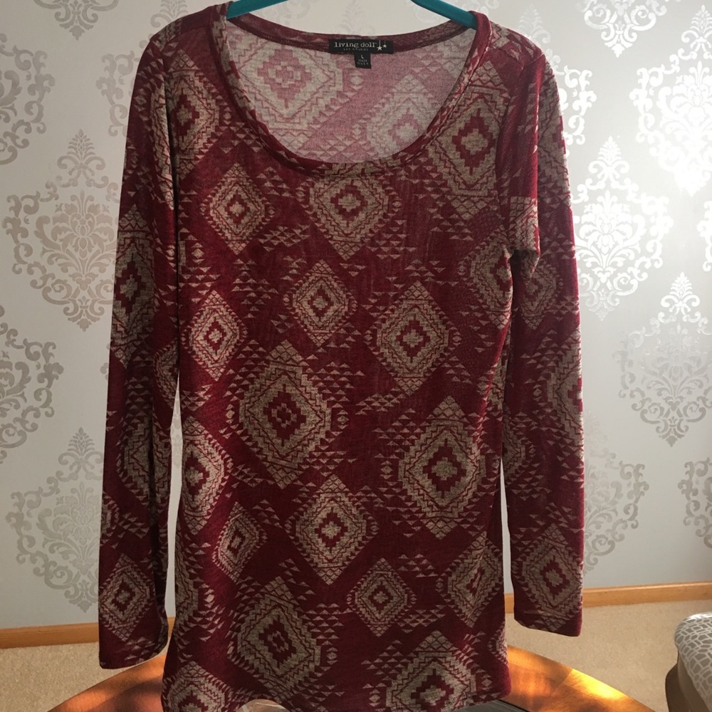This is a deep red and cream patterned top.