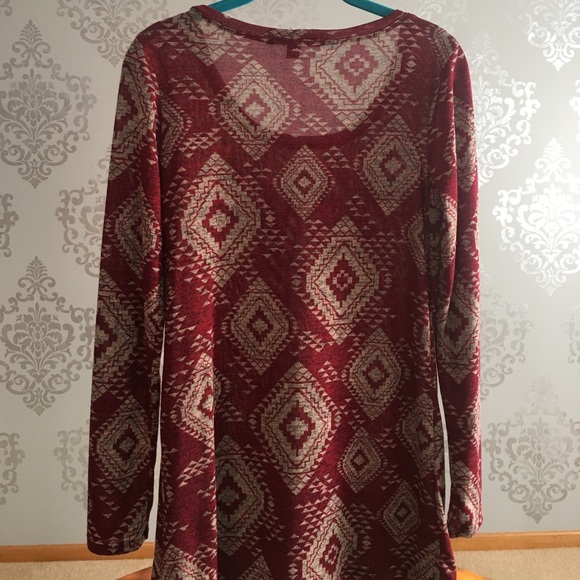 This is a deep red and cream patterned top. - Picture 2 of 4