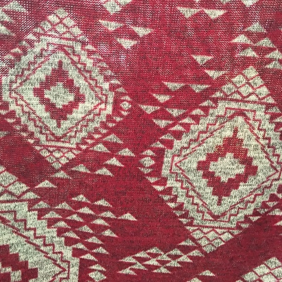 This is a deep red and cream patterned top. - Picture 4 of 4