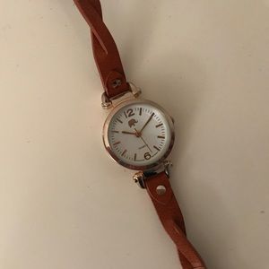 Brown and gold watch