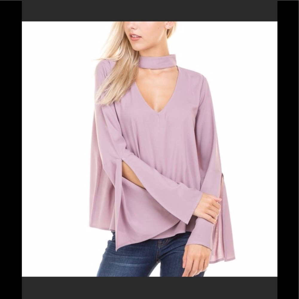 Stunning Rose bell sleeved blouse.