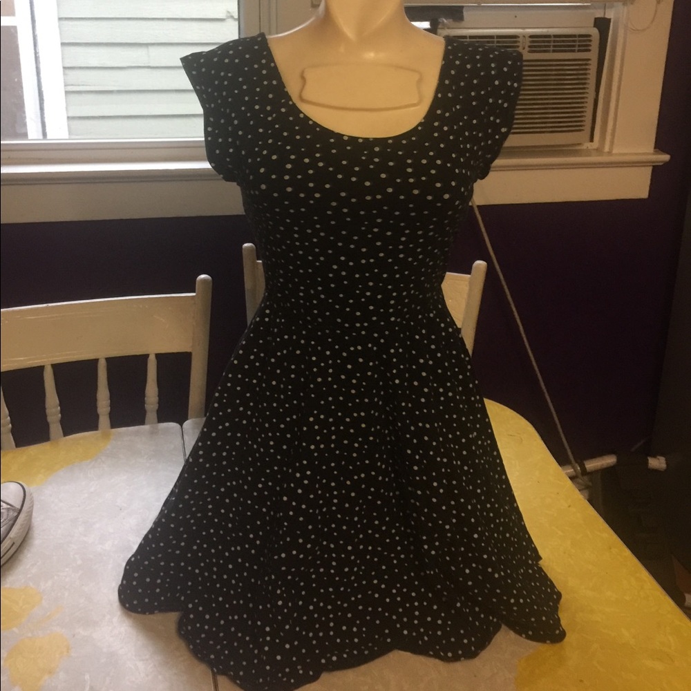 Black dress white polk-a-dots.