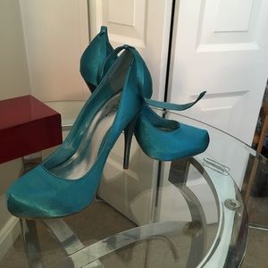 Teal satin pumps