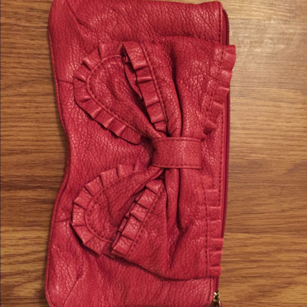 Pink bow clutch