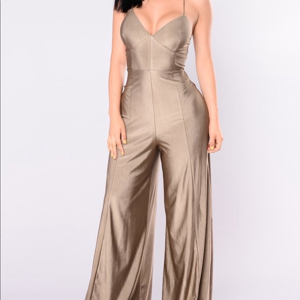 Olive green fashion move jumpsuit. Never worn