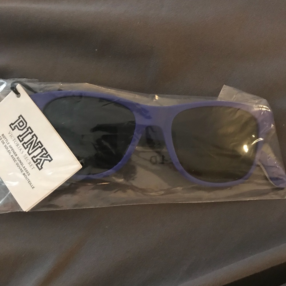 Vs Pink sunglasses with can opener attached