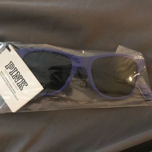 Vs Pink sunglasses with can opener attached