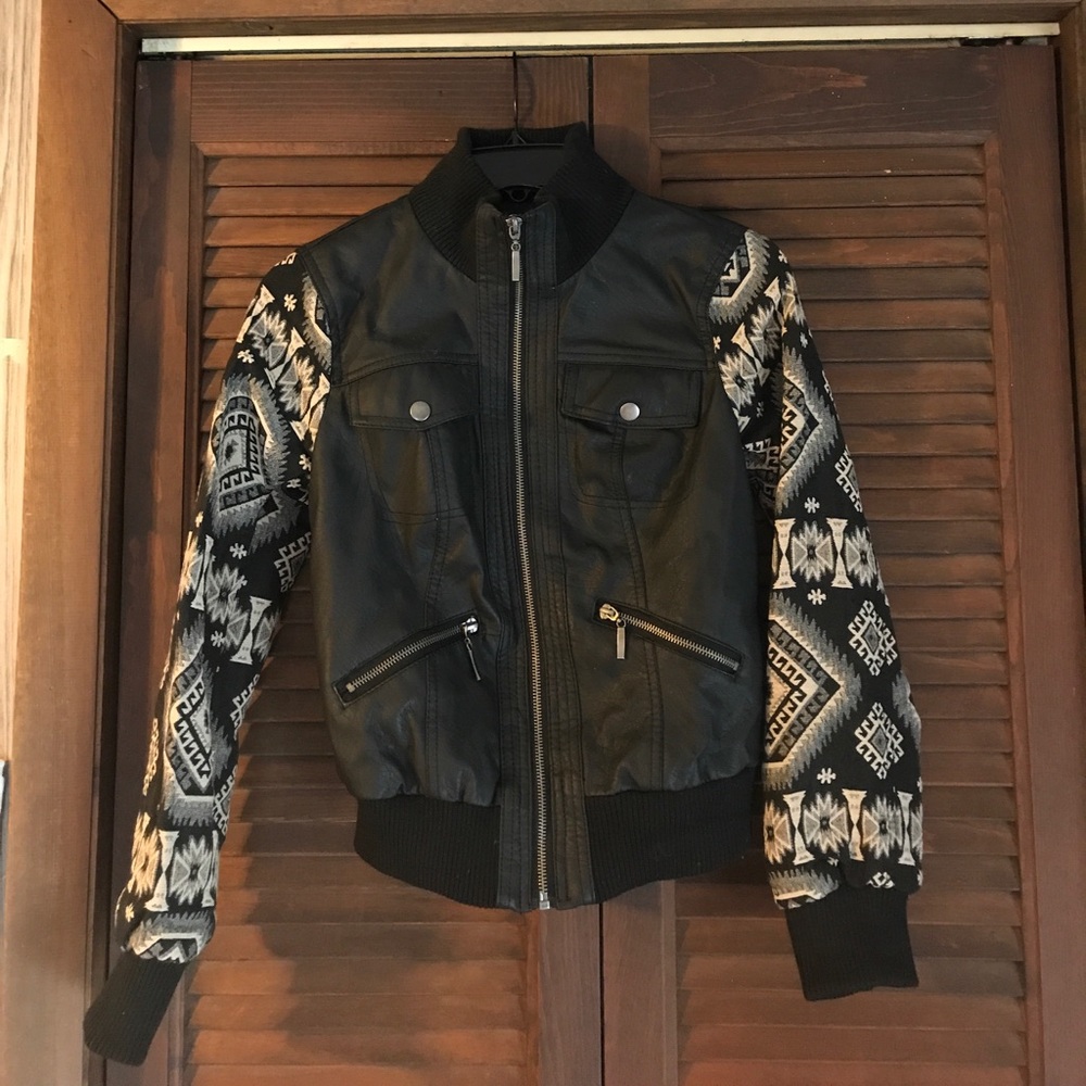 Faux leather jacket with tribal print arms.