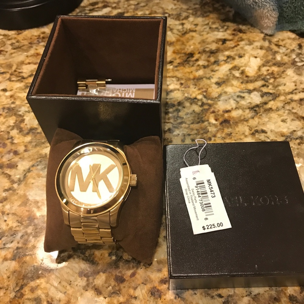Gold MK watch