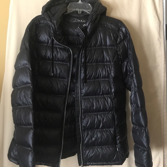 Calvin Klein Jackets & Blazers - Calvin Klein ladies hooded packable jacket.  NEW