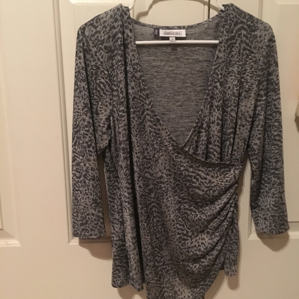 Jennifer Lopez light dress shirt