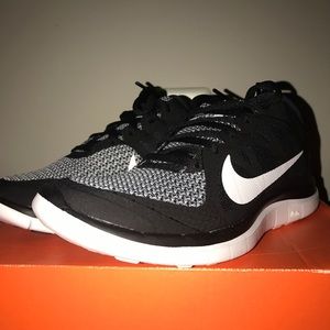 Kids black and white Nike Free Runs 4.0