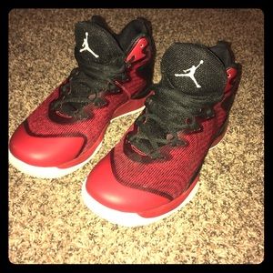 Here we have black red and white Jordan’s