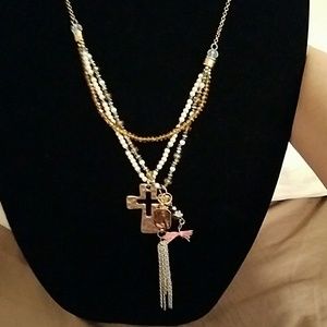 Long goldtone w/charms