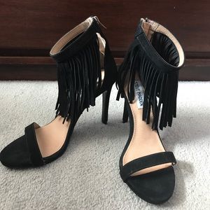 Never worn Steve Madden black fringe heels