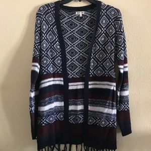 Decorative striped cardigan.