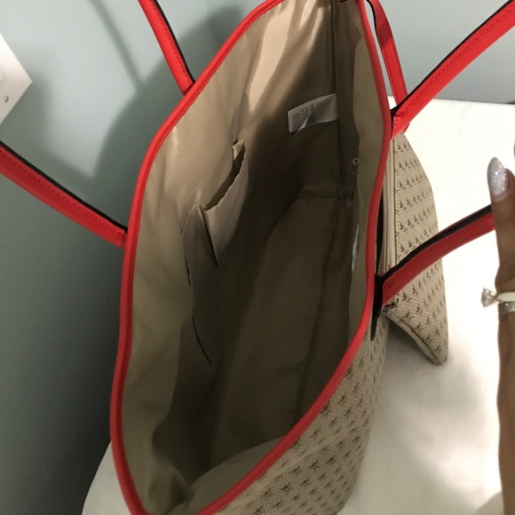 Large spacious bag with attached wristlet - Picture 2 of 3