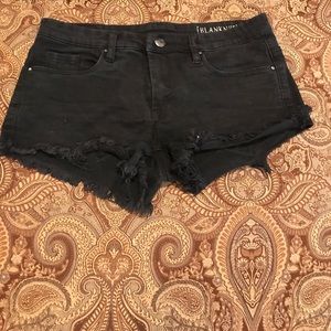 Black denim shorts