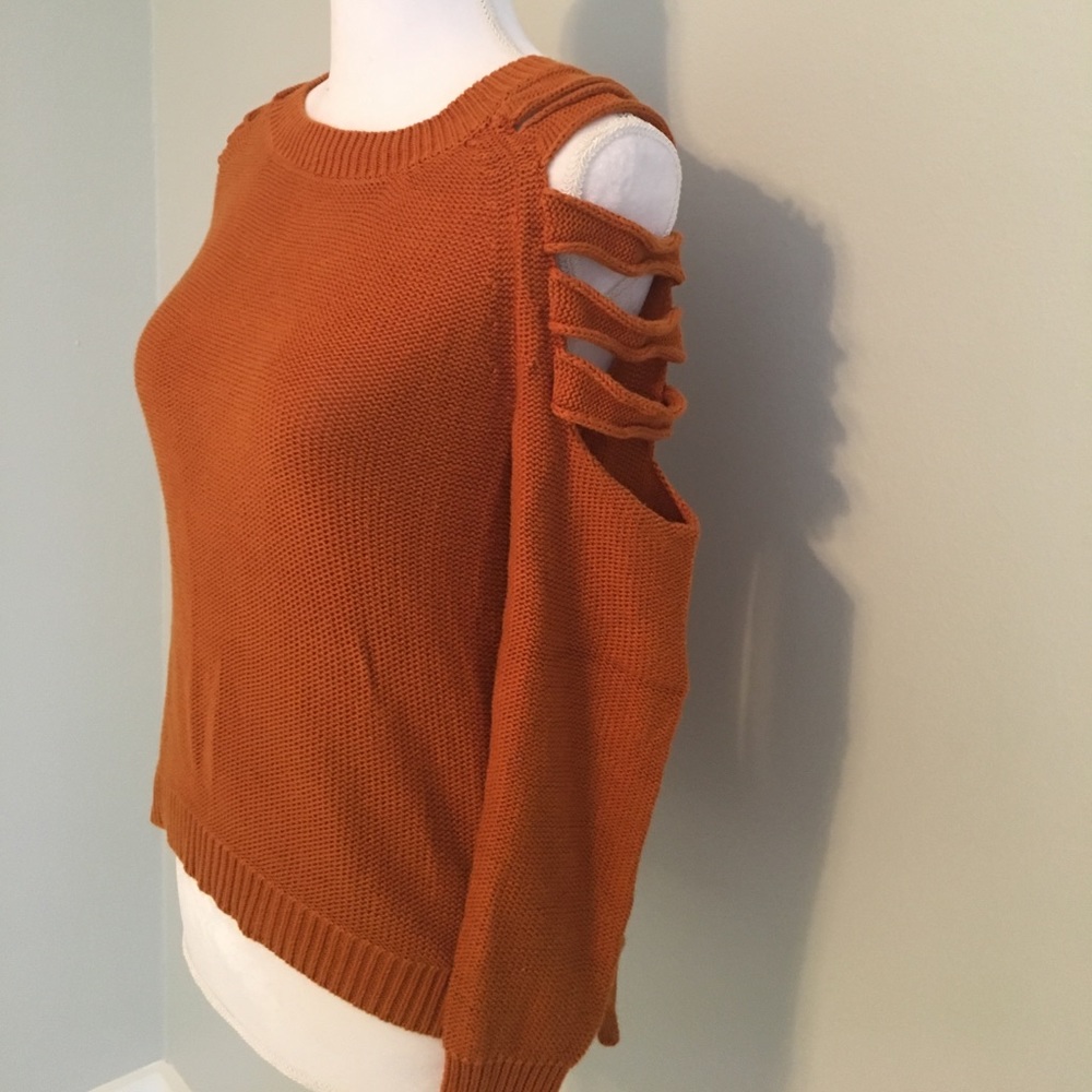 Cold shoulder burnt orange sweater