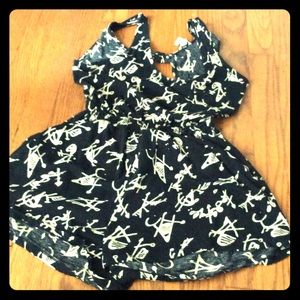 Black and cream patterned romper