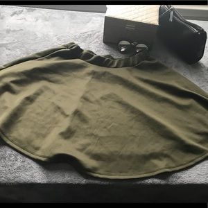 Olive green skirt. Elastic band waist.