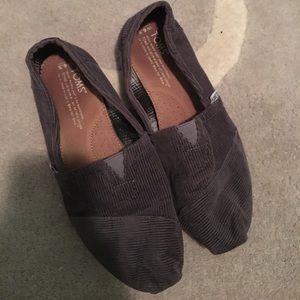 Gray TOMS with pink bottom.