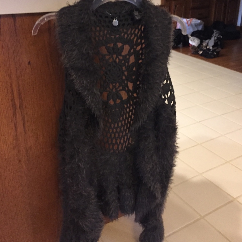 Faux fur sweater vest.