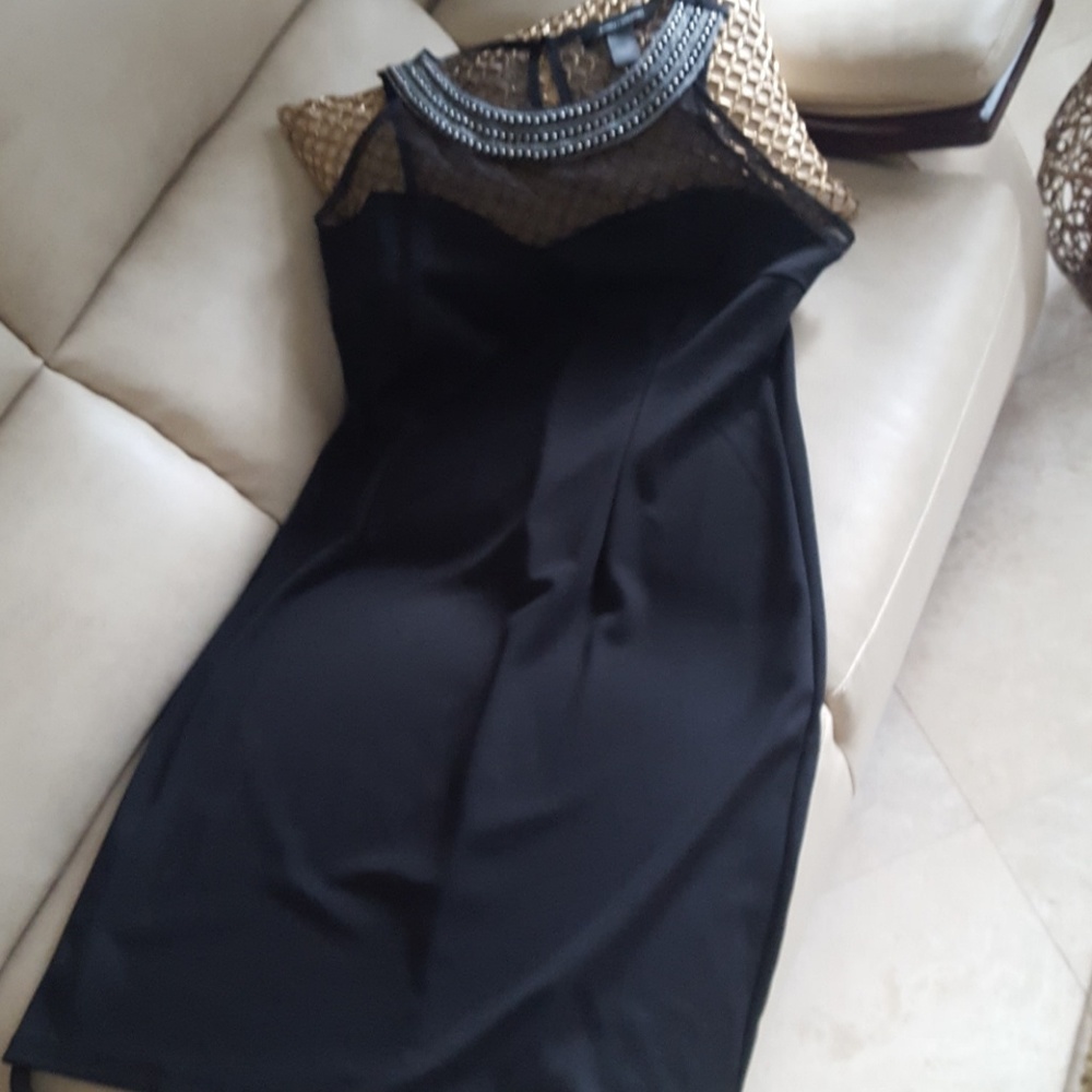 Black Sleeveless Dress with Accent Neckline Accent